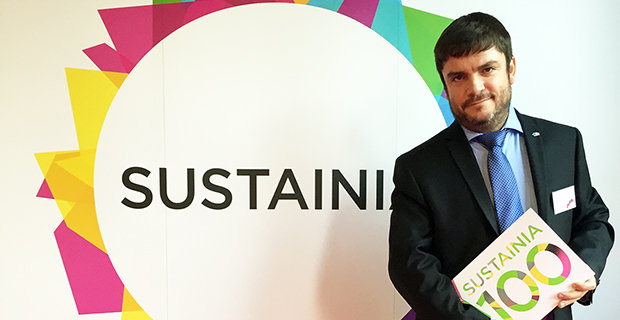 Country Director, Noll Tufani, receiving award.