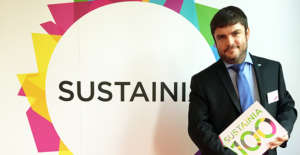 Country Director, Noll Tufani, receiving award.