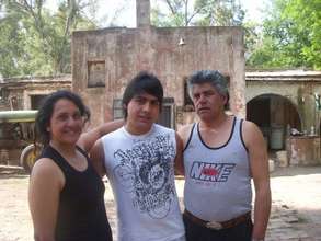 Gaston and his parents Patricia and Alberto Madera