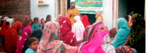 Meeting with women to enroll Girls in School