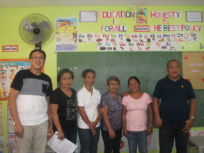 Day care center accreditor and barangay leaders