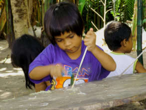 Marj helps her father by cleaning out the sticks.