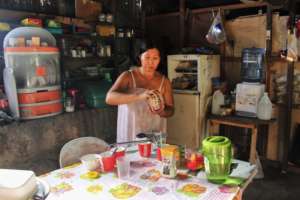 She starts to prepare food to sell at 4 a.m.
