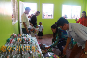 Each child receives a school kit and a toy.