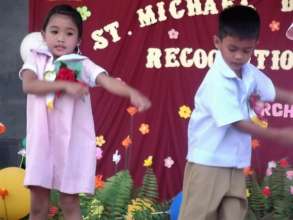 LA (left) in a dance number during the event.