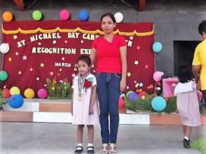Proud Mom stands beside gold medalist daughter, LA