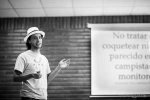 Guido, FDJE youth leader, leading camp protocol