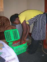Rose packing fruits in her container