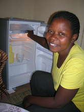 Help Rose expand her grocery business in Uganda