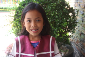 Maylin's expression of joy and gratitude
