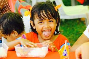 Free meals were given to some 10,000 kids like Yna