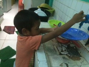 In the shelter, he is trained to do simple chores.
