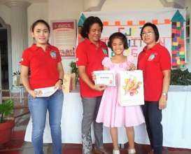 CJFI staff awards Joanna for her good performance.