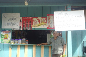 Ines In Front Of His Store