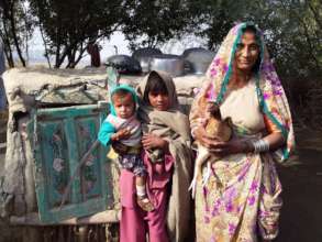 A Bajani Women happy with chicken rearing