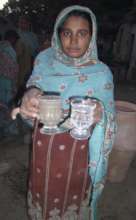 Bajani Gilr happy with safe drinking Nadi filter w