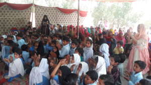 Children and women are happy and clapping