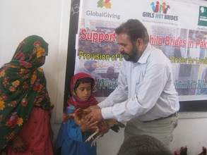 Amina age 7, Receiving Hens with your support