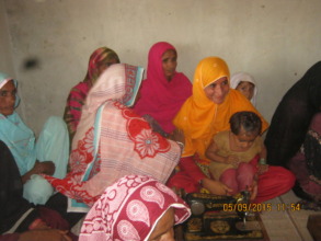 Child Bride with her Child is happy to be skilled