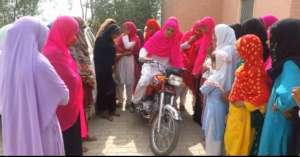 Saima is trying to drive bike