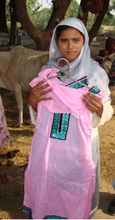 Sobia is displaying her own dress prepared by her