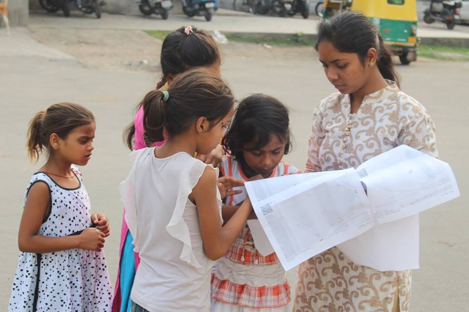 Girls identifying issues in the community