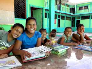 Girls enjoying reading