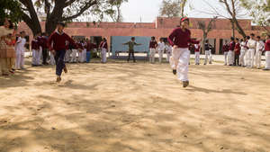 Boys and girls playing together in a school