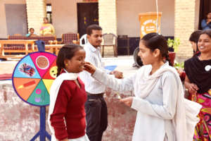 Girls participating in a TKT interactive session