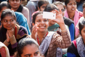 A student at a youth event with colleges