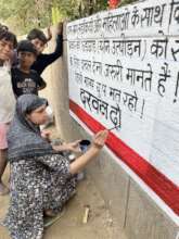 Delhi TCL writing slogans on the walls of Delhi 2
