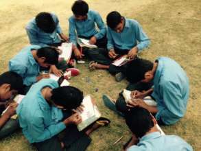 Students drawing greeting cards on TKT