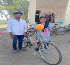 Nikita being gifted the bike!