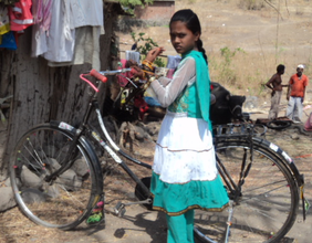 Rani with her new bicycle