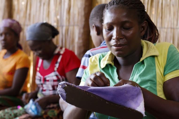 Making shoes for barefoot children in Mozambique