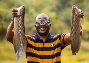 Showcasing success during harvesting of fish ponds