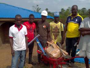 students posed for picture after receiving supplie
