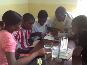 EKARI students using lab equipment for experiments