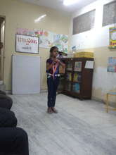 Mahima reciting a poem at Maitri's Tutorial Centre