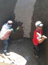 Community fathers lend a hand in the construction