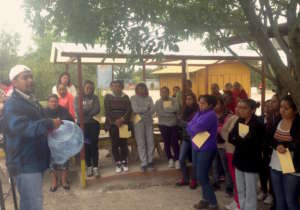 Staff works with mother's group at school install
