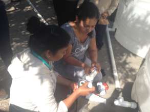 Mothers install rainwater system at local school