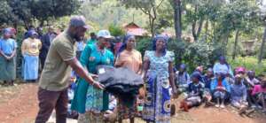 Distributing grow bags to women in Meru, Kenya