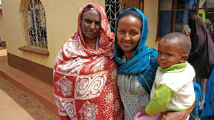 Naima with a member of the women's group