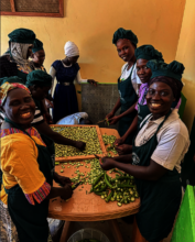 Women dehydrating okra to preserve their harvests