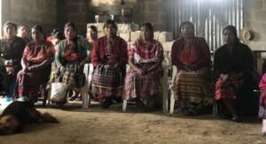 Women joining a meeting in Guatemala