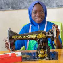 Hadiza at Zarumai model school acquisition event.