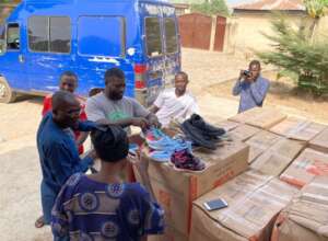 Boxes of shoes arrive Minna.