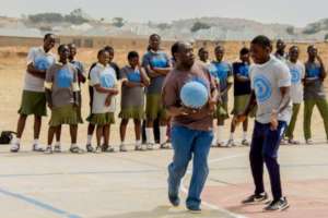 The Bishop playing some basketball with the kids