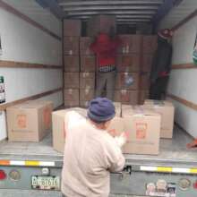 Trucks full of donated shoes and material for 2023